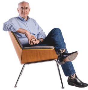 Image of Phil Gilbert sitting, facing the camera